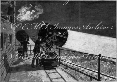 Manœuvre des projecteurs sur la Tour Eiffel. エッフェル塔の上の投光器の操作