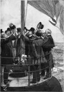 Le couronnement de la Tour Eiffel. - M. Eiffel arborant le drapeau tricolore au sommet de la Tour. エッフェル塔の戴冠 塔のてっぺんにフランス三色旗を掲げるエッフェル氏