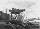 "Rue et appareil de levage, exposé sur la berge de la Seine." 道路沿いのセーヌ河岸に展示されたクレーン