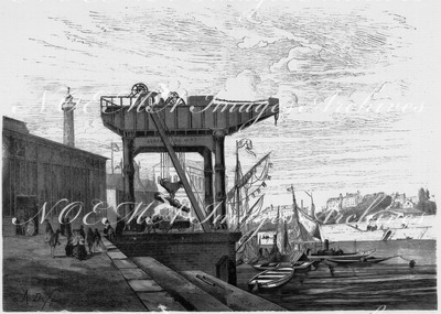 "Rue et appareil de levage, exposé sur la berge de la Seine." 道路沿いのセーヌ河岸に展示されたクレーン